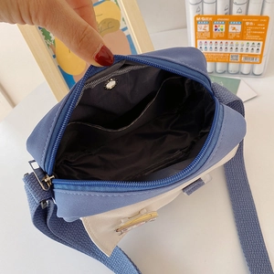 Japanese style blue and white nylon crossbody bag with adjustable strap and inner pocket