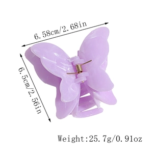 Detailed size view of the purple resin butterfly hair claw clip with gold metal spring