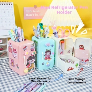 Close-up of refrigerator-shaped desk organizers in pink, blue, and white with cute stickers