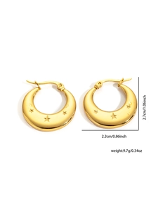 Detailed view of gold star and moon engraved hoop earrings with size measurements
