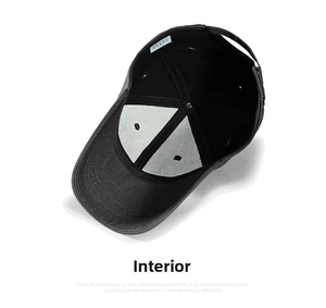 Detailed interior of the cotton baseball cap with contrast lining and product tag