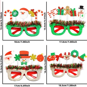 Detail view of 4 Christmas party glasses with glitter finish and spring-mounted festive icons