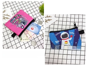 Detail of canvas astronaut coin pouches with zip closure and portable lanyard strap
