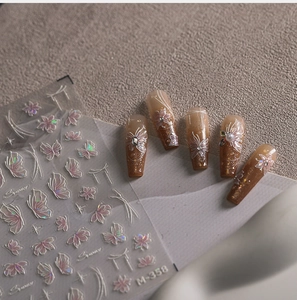 Detailed laser holographic butterfly and cherry blossom nail art sticker on brown nails