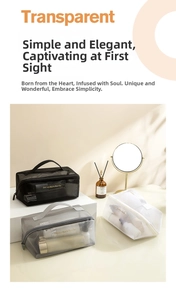 Three transparent mesh makeup bags in black, grey, and white shown on a sunlit desk