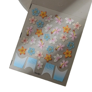 3D floral nail art stickers with embossed hibiscus and gradient French manicure patterns