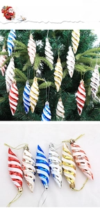 Detail view of spiral icicle Christmas ornaments in various colors with white glitter