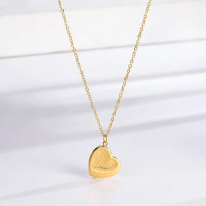 Golden titanium steel heart necklace with honeycomb pattern and Forever engraving