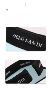 Detail of adjustable elastic band and embroidery on black open top sun hat