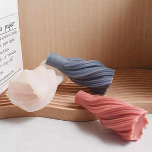 Detailed view of spiral ribbed silicone molds for DIY scented candles and plaster art