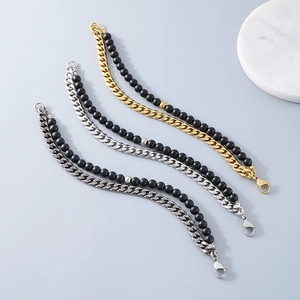 Three vintage Cuban chain bracelets with black onyx beads in gold, silver and gunmetal finish