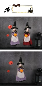 Detail of hanging witch figurines in purple and red dresses for Halloween decoration
