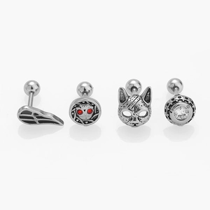 Set of four silver stainless steel stud earrings with wing, skull and cat designs