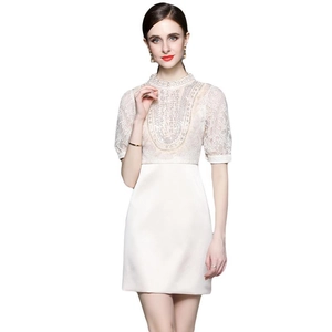 Elegant off-white short sleeve lace patchwork dress with heavy beaded details