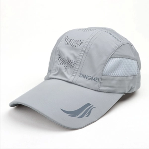 Detail of dark grey breathable mesh panels and laser-cut holes on the dry-fit sports cap