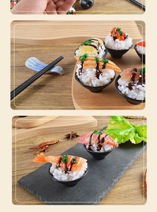 Macro shot of realistic sushi food models with shrimp and roe on textured base