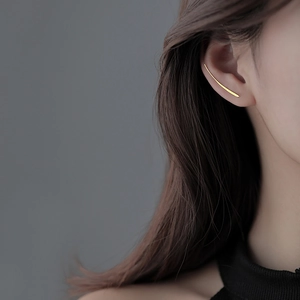 Minimalist golden curved ear climber crawler earrings for women in modern style
