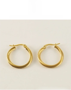Detail of twisted rope texture and latch back closure on gold-plated hoop earrings