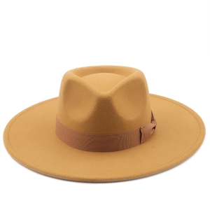 Detail of wool fedora hat featuring matching grosgrain ribbon and bow decoration