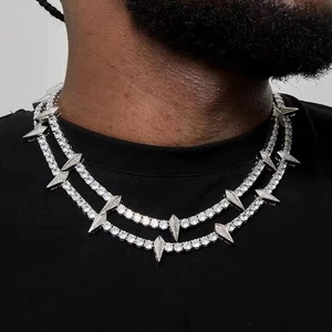 Close-up of a silver 5mm tennis chain with sparkling spikes and rhinestones for men