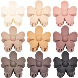 Detailed grid of nine matte flower hair claws in varied neutral and earth-toned colors