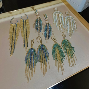 Elegant U-shaped silver needle tassel earrings with pearls and rhinestones in luxury style
