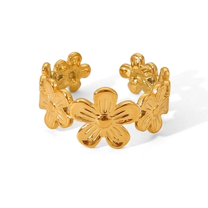 Polished gold flower ring made of stainless steel displayed on a clean white background