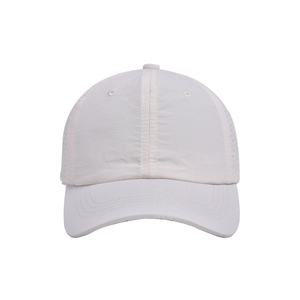 Close-up of white breathable mesh fabric and panel stitching on the sun baseball cap