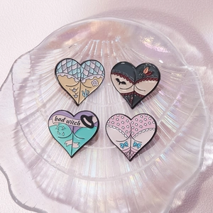 Creative 4-piece Halloween heart enamel pin set with cartoon gothic and witch designs