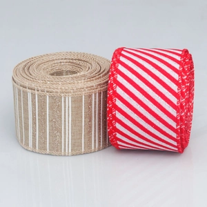 Detail of wired edge plaid faux linen ribbons in cream stripes and red chevron patterns