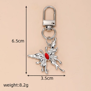 Silver crystal butterfly keychain detail with dimensions 6.5cm by 3.5cm and 8.2g weight