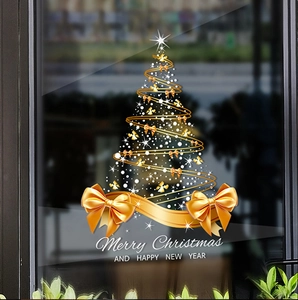 Golden bow Christmas tree static window decal with glowing spiral lines and festive text