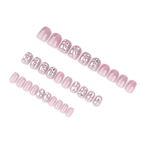 Pink gradient press-on nails with silver glitter and sparkling rhinestones set