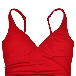 Detailed view of the red V-neckline with pleated fabric on a sexy backless dress