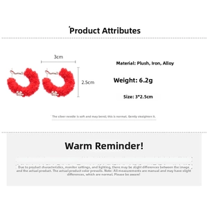 Macro view of red flocked snowflake hoop earrings with 3cm x 2.5cm size and 6.2g weight