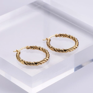 Classic gold twisted rope hoop earrings in minimalist titanium steel design