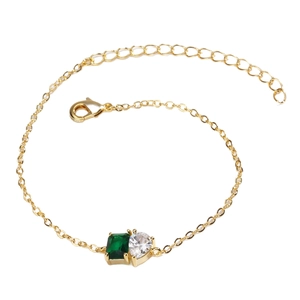 Bracelet plaqué or avec zircon vert taille émeraude et pierre blanche en forme de cœur