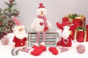 Detail view of plush Christmas dolls with striped telescopic legs and knitted outfits