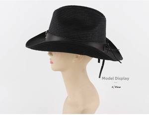 Detailed side view of black straw cowboy hat with leather band and metal buckle detailing