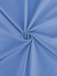 Close-up of blue twill fabric texture showing soft fibers and smooth weave pattern