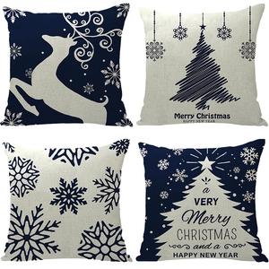 Set of four Christmas linen pillow covers featuring reindeer and snowflake designs