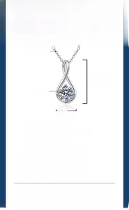 Macro view of S925 silver moissanite necklace with 1 carat teardrop pendant details