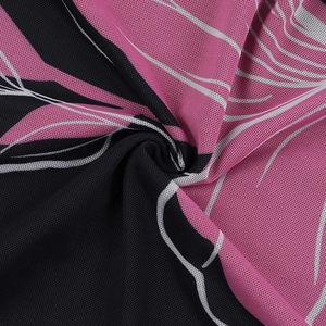 Detail of soft breathable mesh fabric with pink and black abstract floral pattern