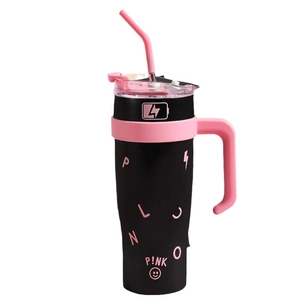 Black 40oz insulated tumbler with pink handle and straw featuring lightning graphic