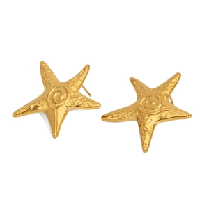 Golden starfish stud earrings with embossed spiral texture on a clean white background