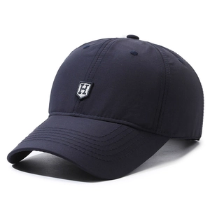 Men's navy blue breathable baseball cap with H letter embroidery shield in 45-degree view