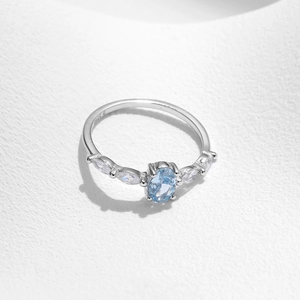 Elegant S925 sterling silver ring with light blue oval crystal and white diamonds