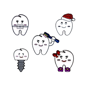 Set of five cute cartoon tooth enamel pins with Christmas hat and dental braces