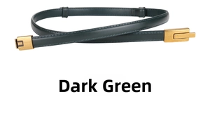 Detail of dark green leather belt with fine stitching and a gold rectangular buckle