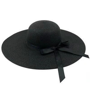 Cappello da sole in paglia nera a tesa larga con fiocco in nastro per la spiaggia